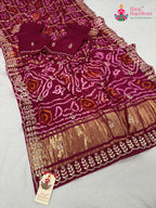 border detailing of soft red fabric saree