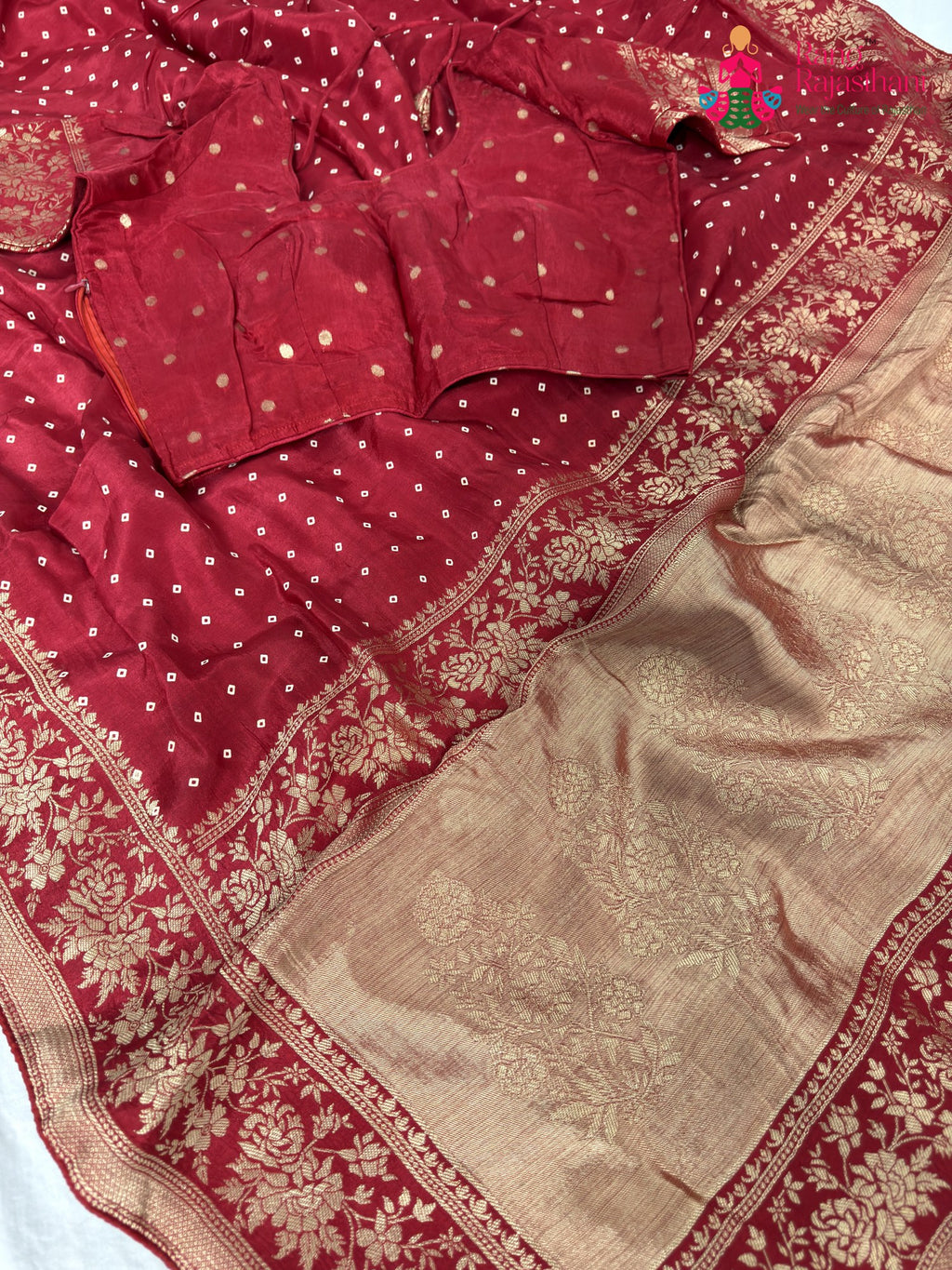 border detailing of soft red saree