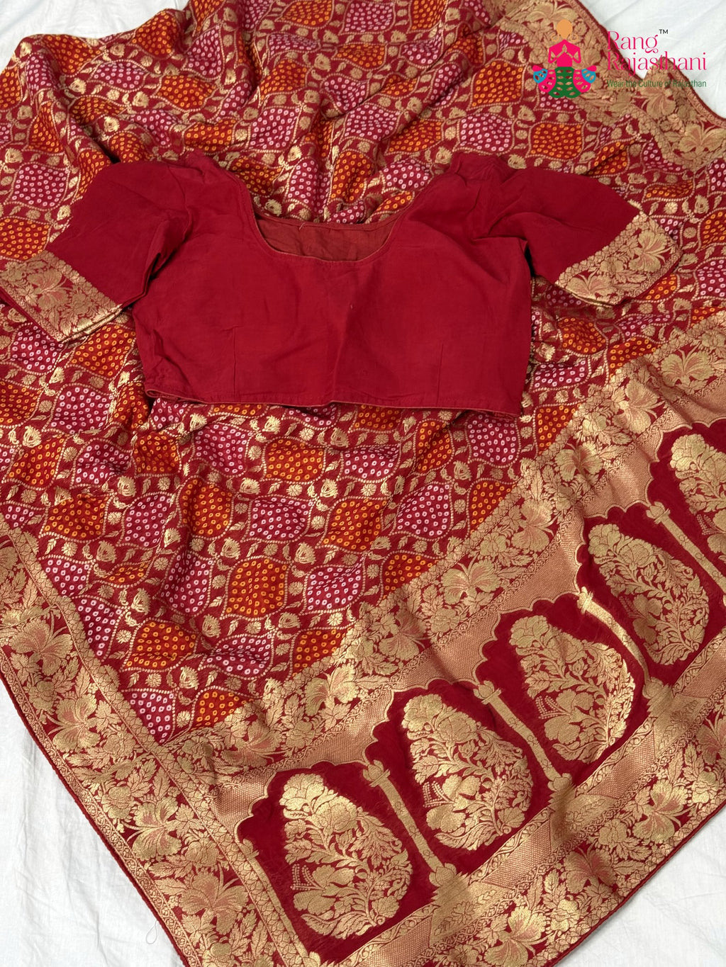 fabric texture of soft red fabric saree