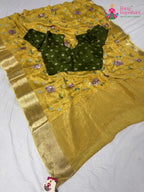 border detailing of soft yellow chinnon saree
