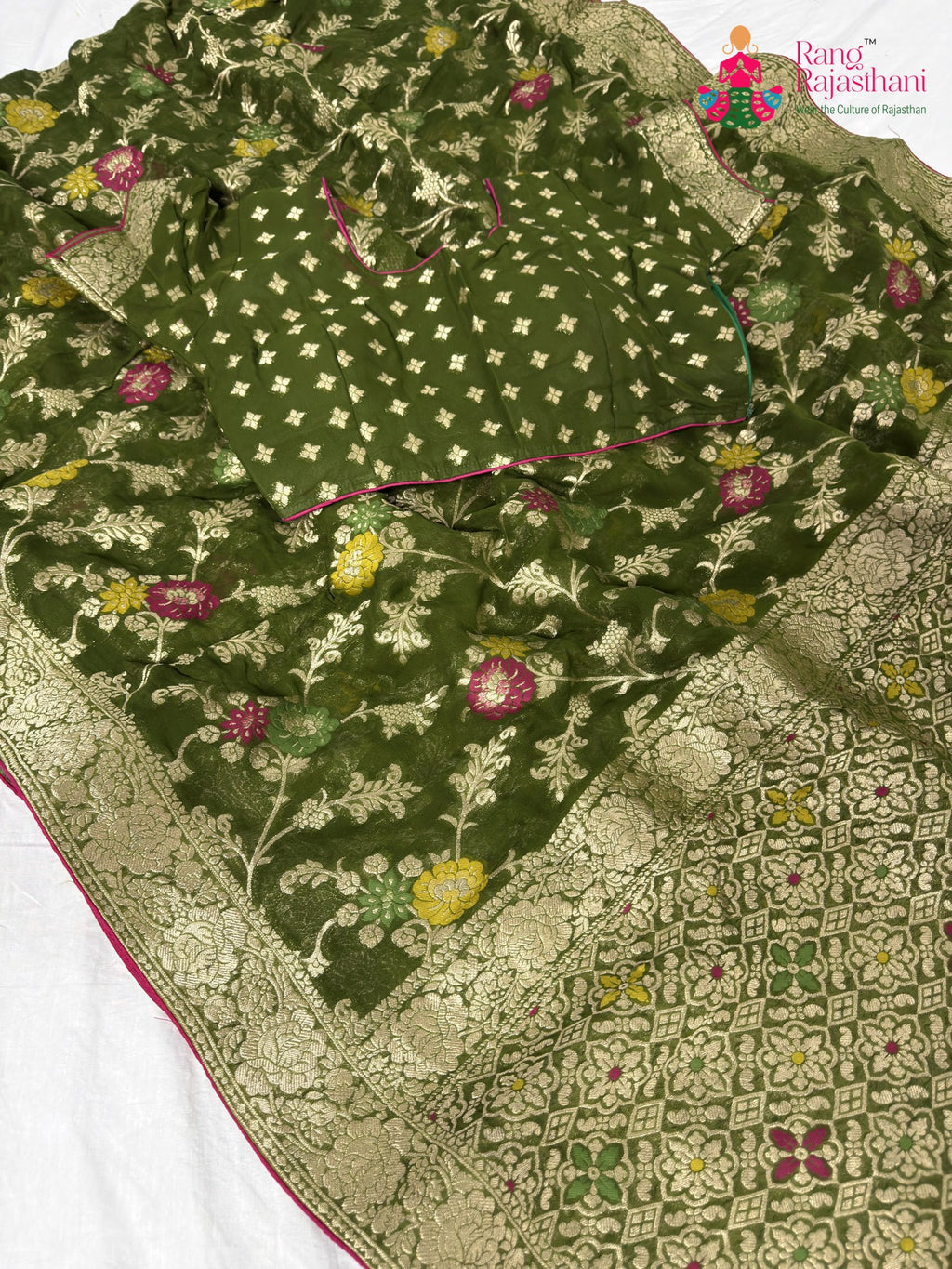 border detailing of statement green fabric saree