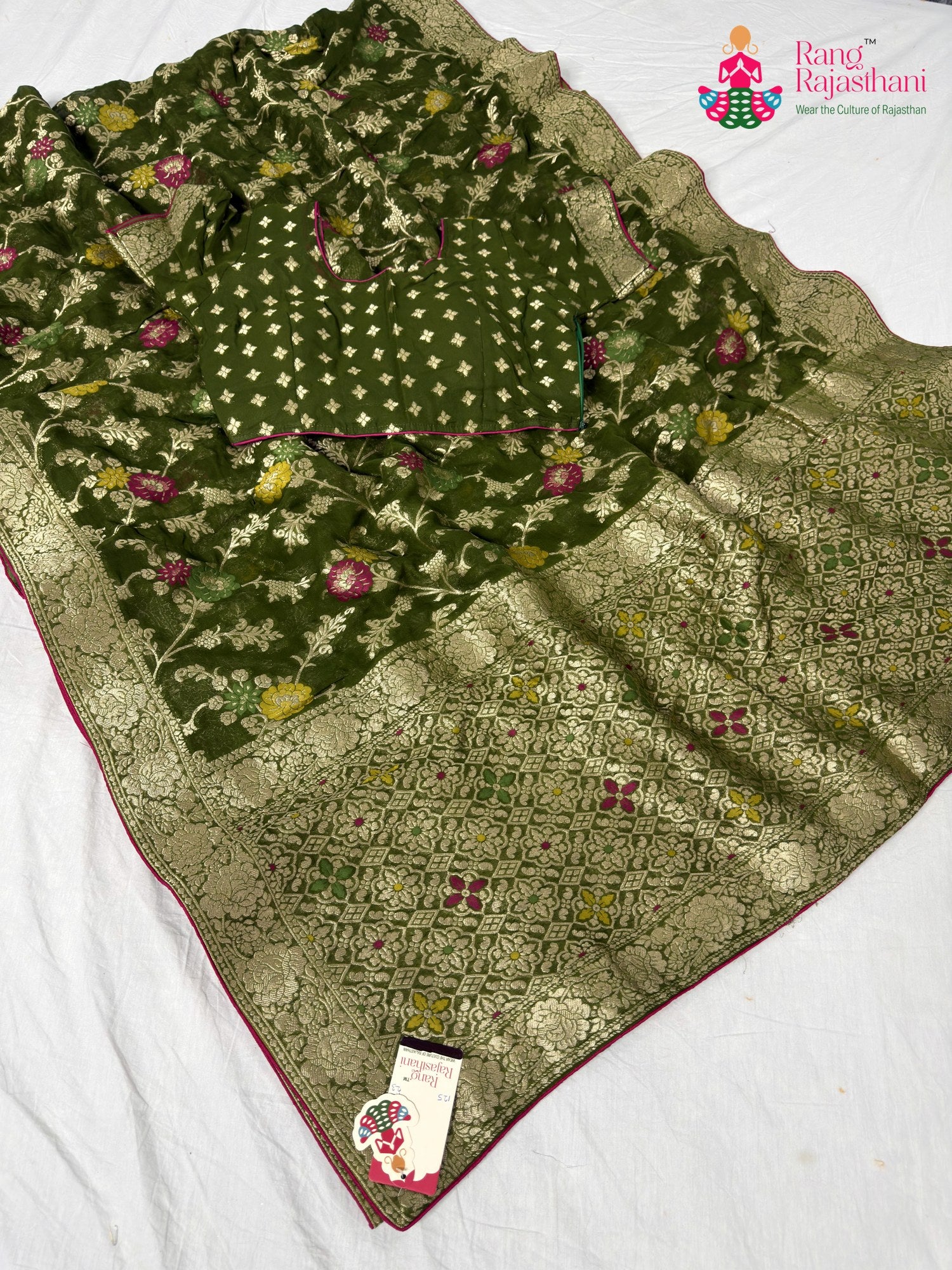 fabric texture of statement green fabric saree