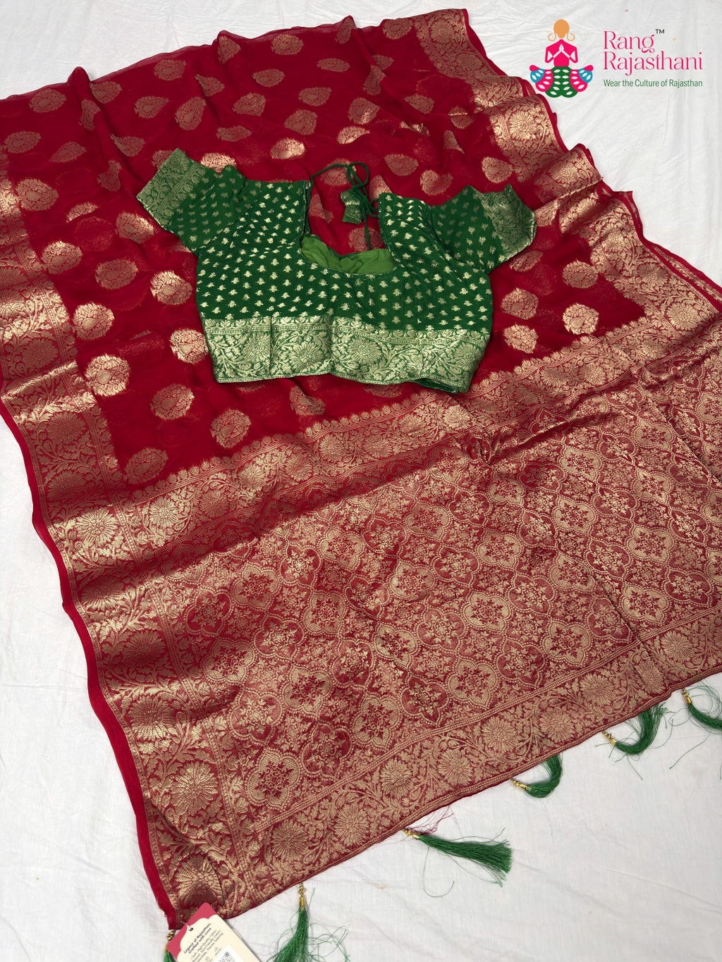 border detailing of statement red georgette saree