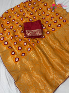 fabric texture of sunlit yellow pure dola silk bandhej banarasi zari saree
