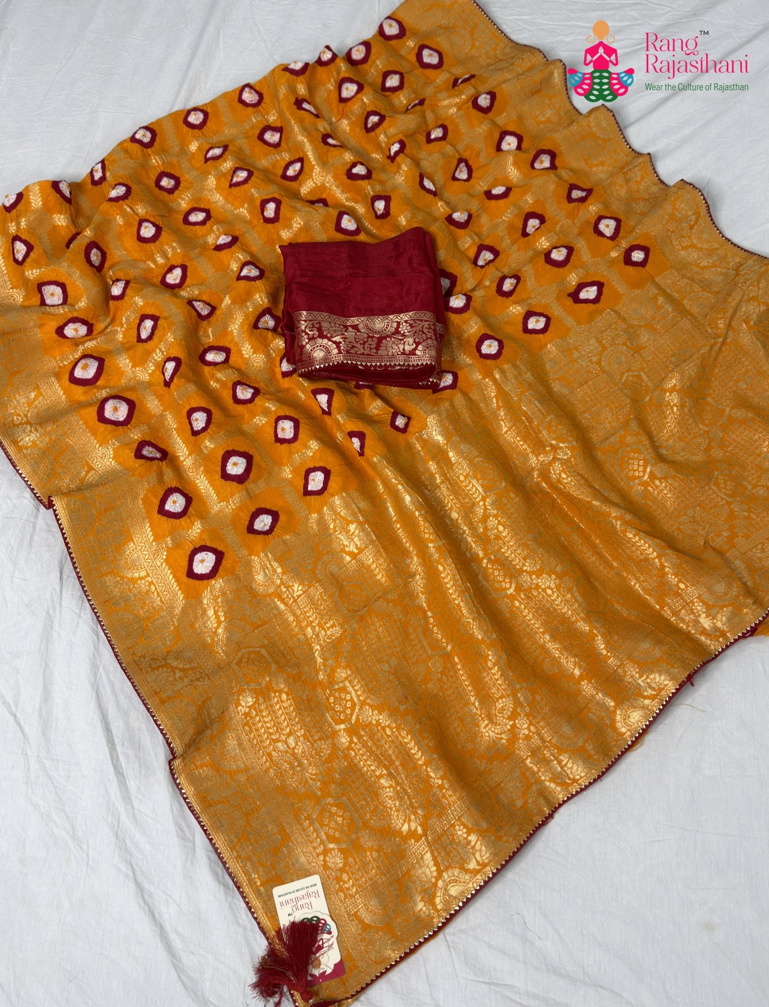 border detailing of sunlit yellow pure dola silk bandhej banarasi zari saree