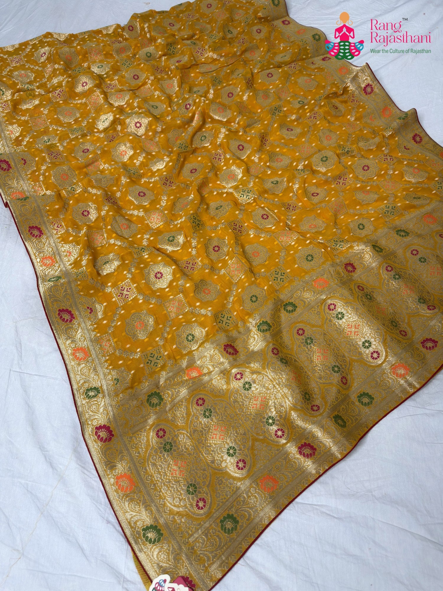 border detailing of sunlit yellow pure georgette khaddi saree