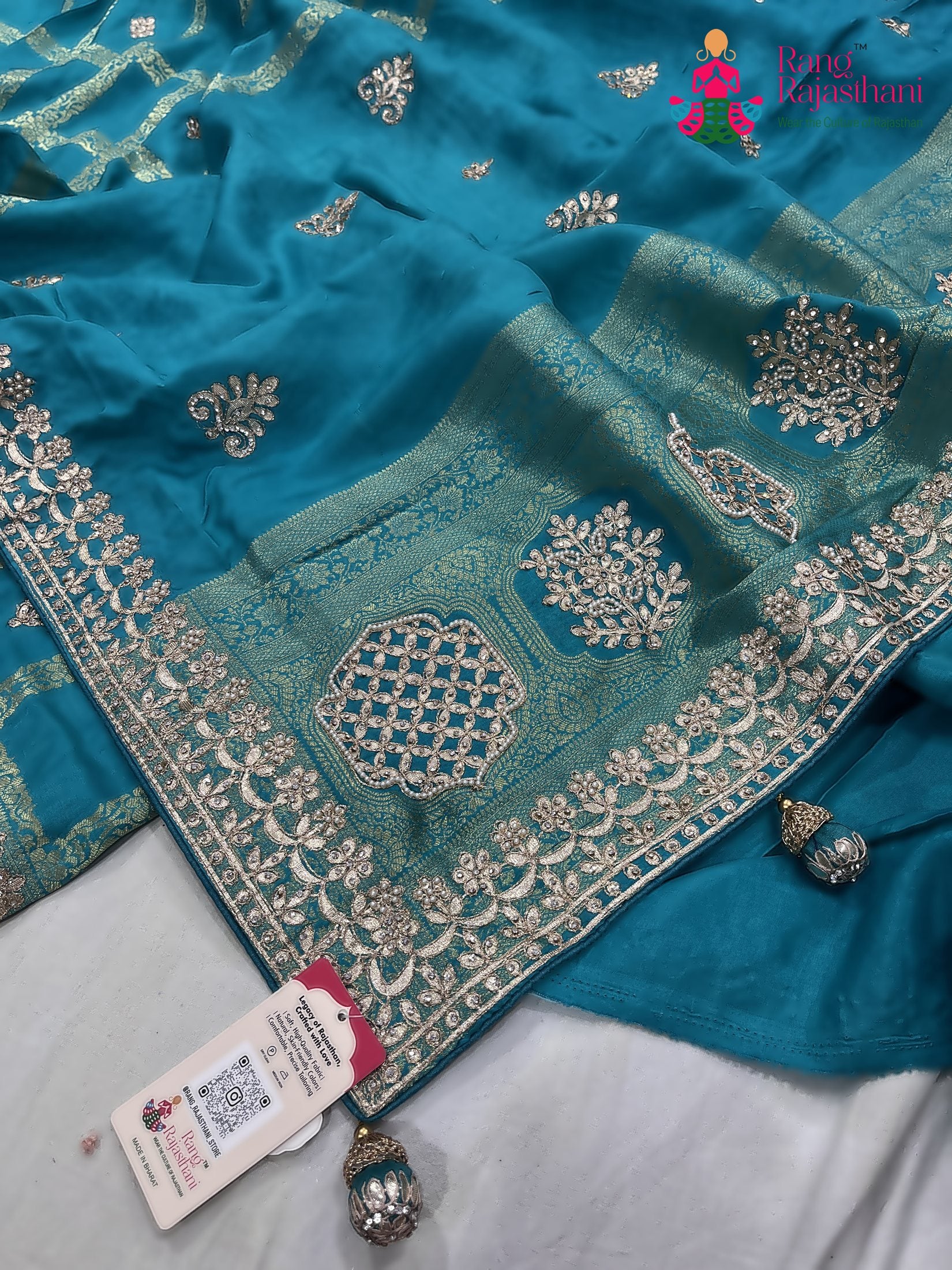 close up detailing of teal art silk gotta patti saree 