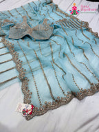 complete look of teal net sequin saree 