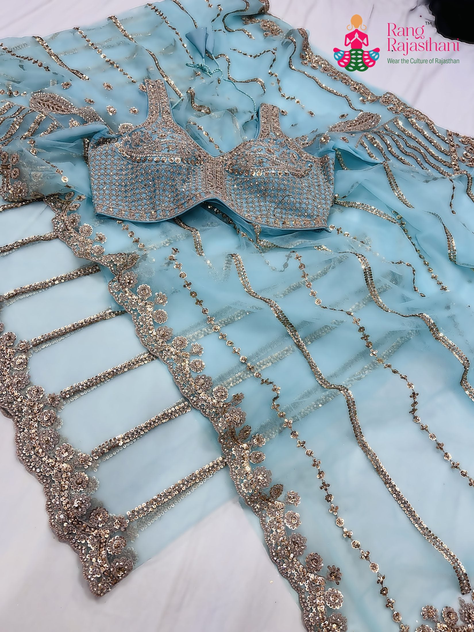 pallu detailing of teal net sequin saree 