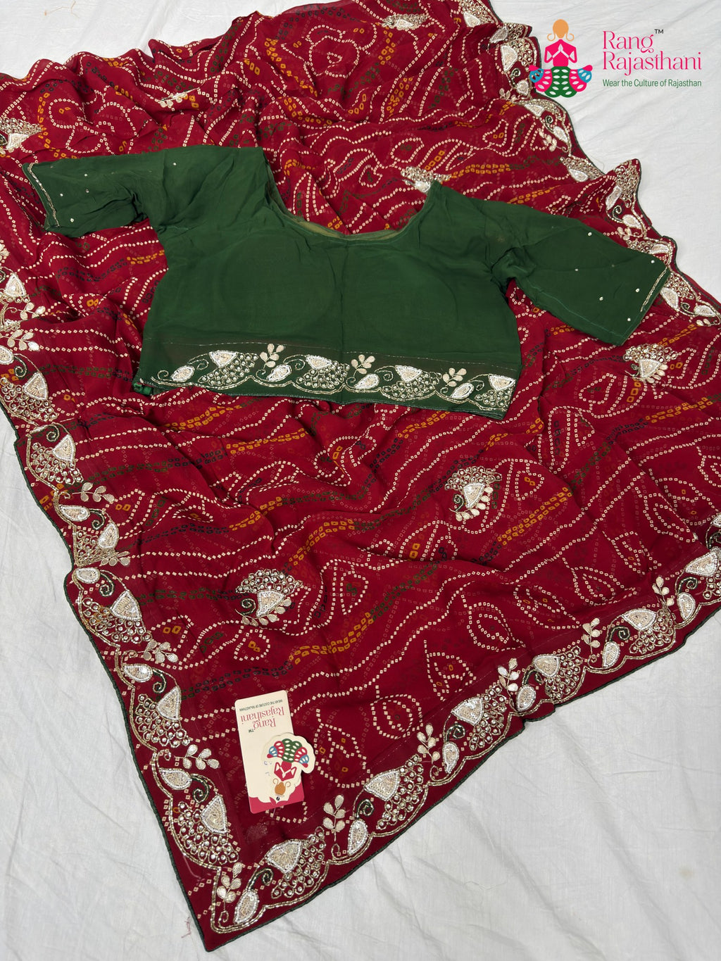 border detailing of traditional red fabric saree