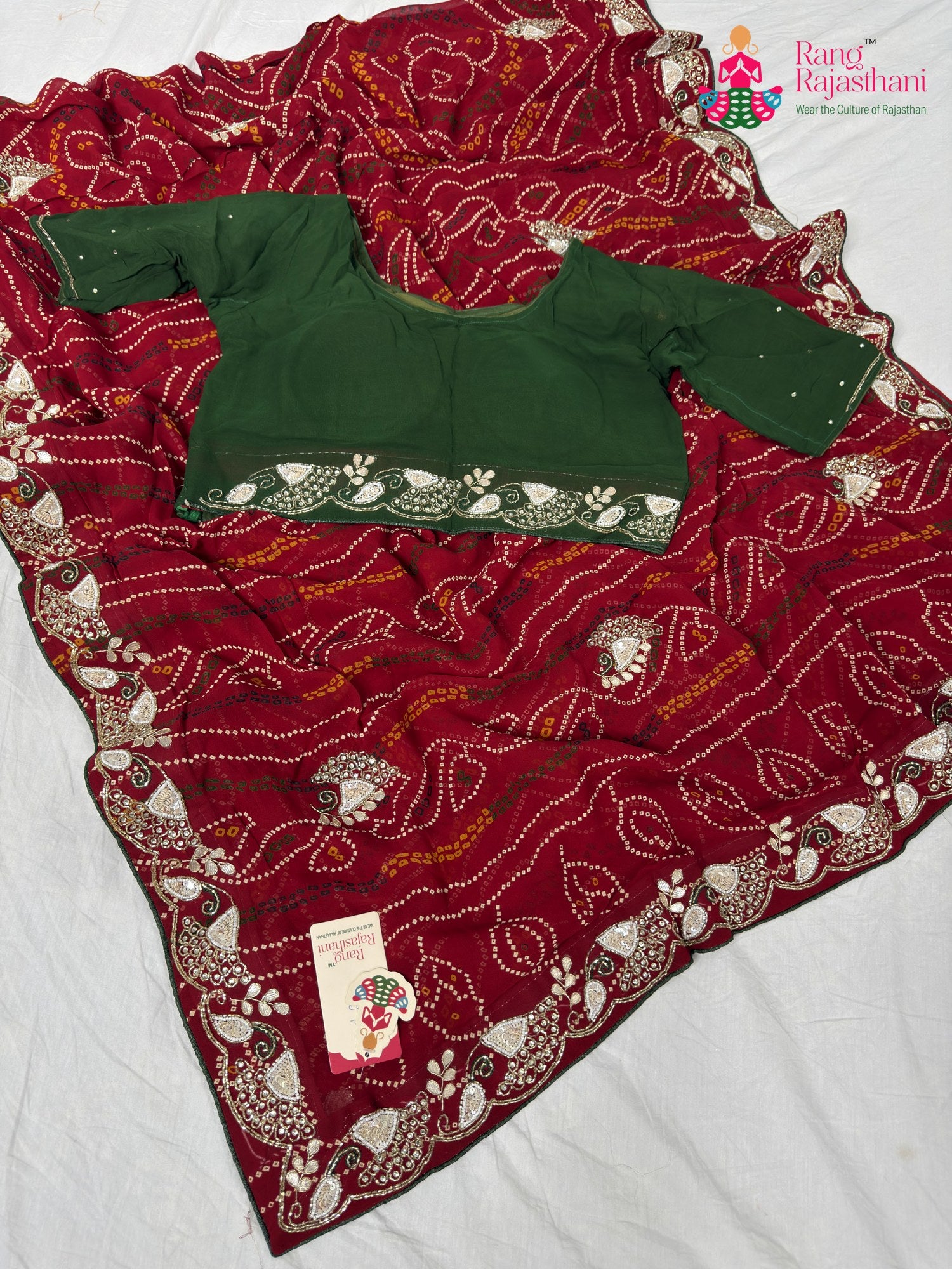 border detailing of traditional red fabric saree