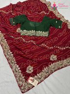 border detailing of traditional red fabric saree