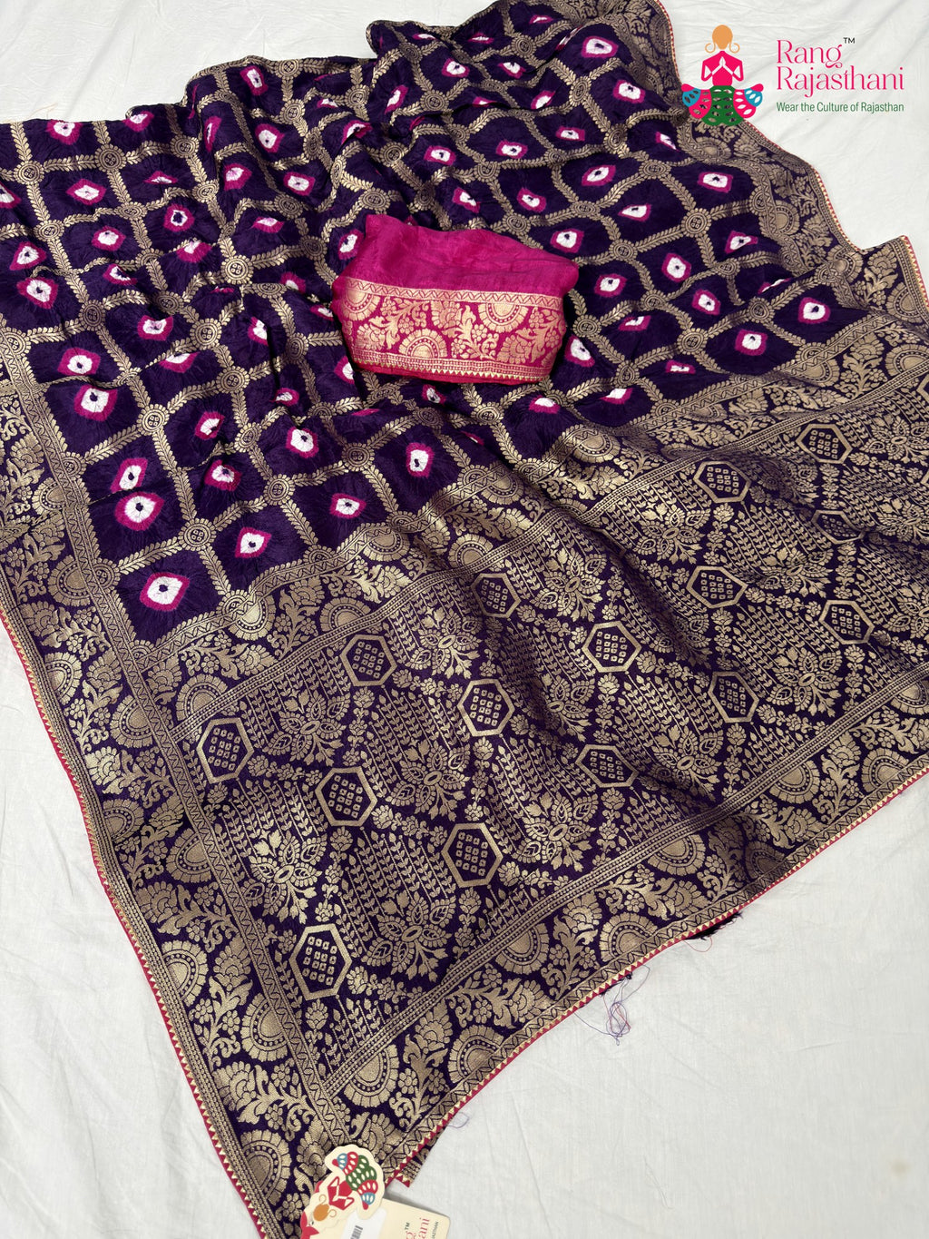 border detailing of violet pure dola silk bandhej banarasi zari saree