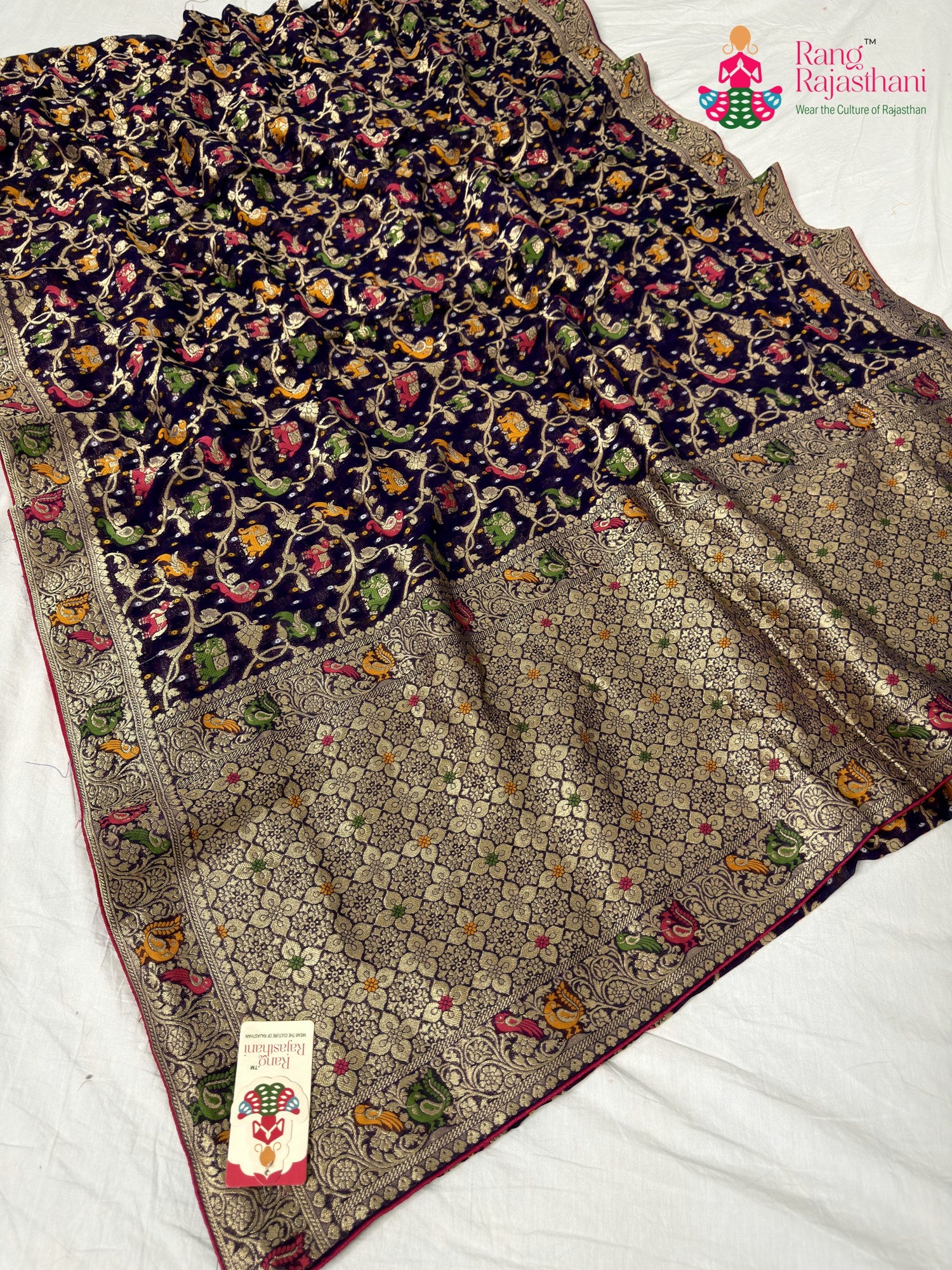 border detailing of violet pure georgette khaddi saree