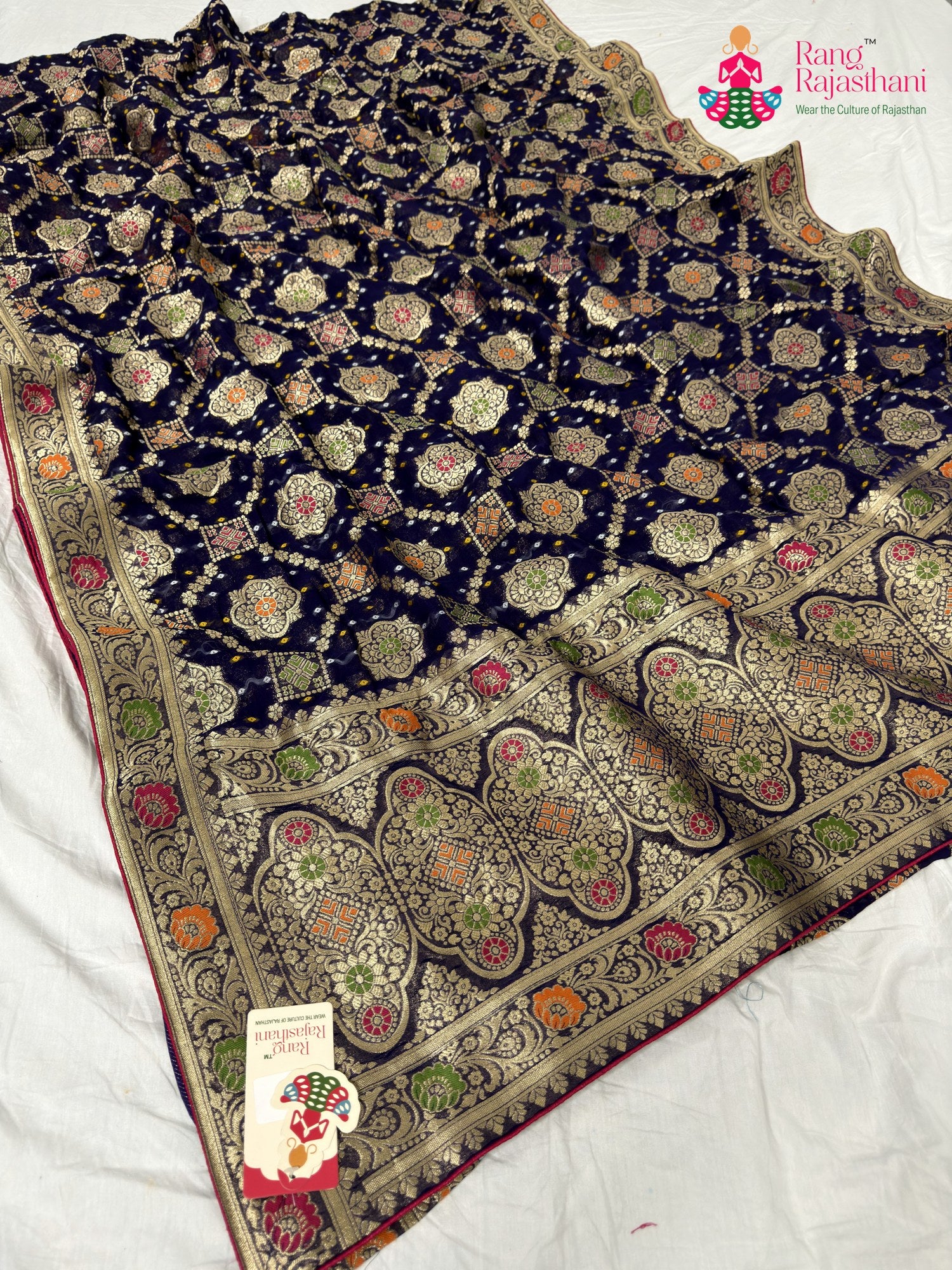 border detailing of violet pure georgette khaddi saree