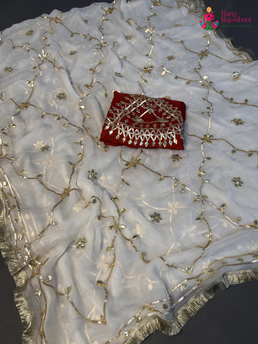 pallu detailing of white chiffon gota patti saree
