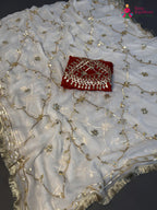 pallu detailing of white chiffon gota patti saree