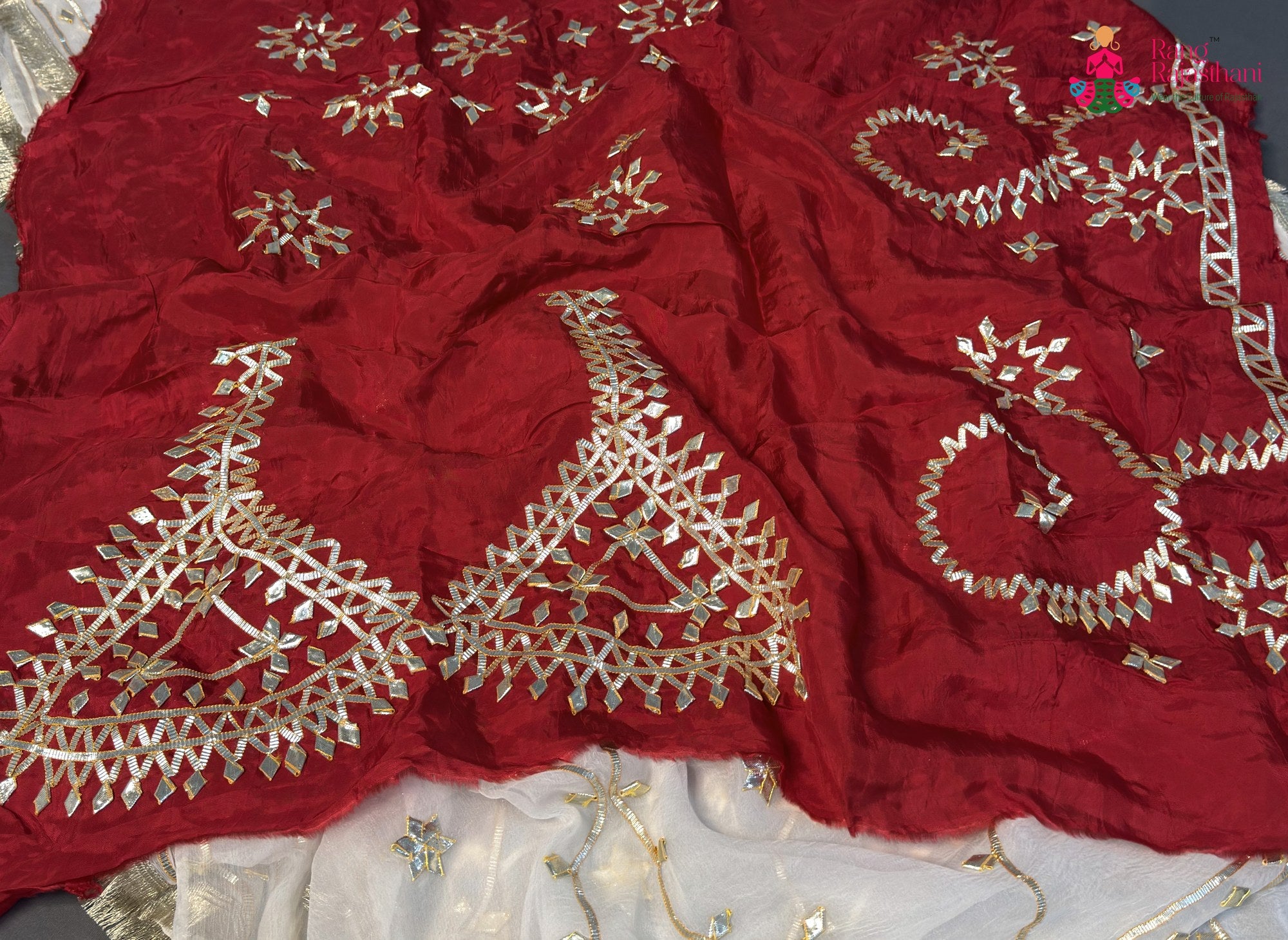 border detailing of white chiffon gota patti saree
