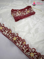 border detailing of white fabric saree