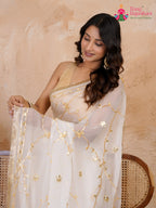 design pattern of white pure chiffon gota patti saree