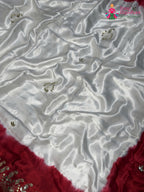 border detail of white pure modal silk gota patti saree