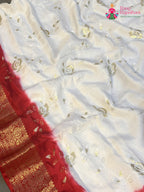 fabric texture of white pure russsian silk sequin saree