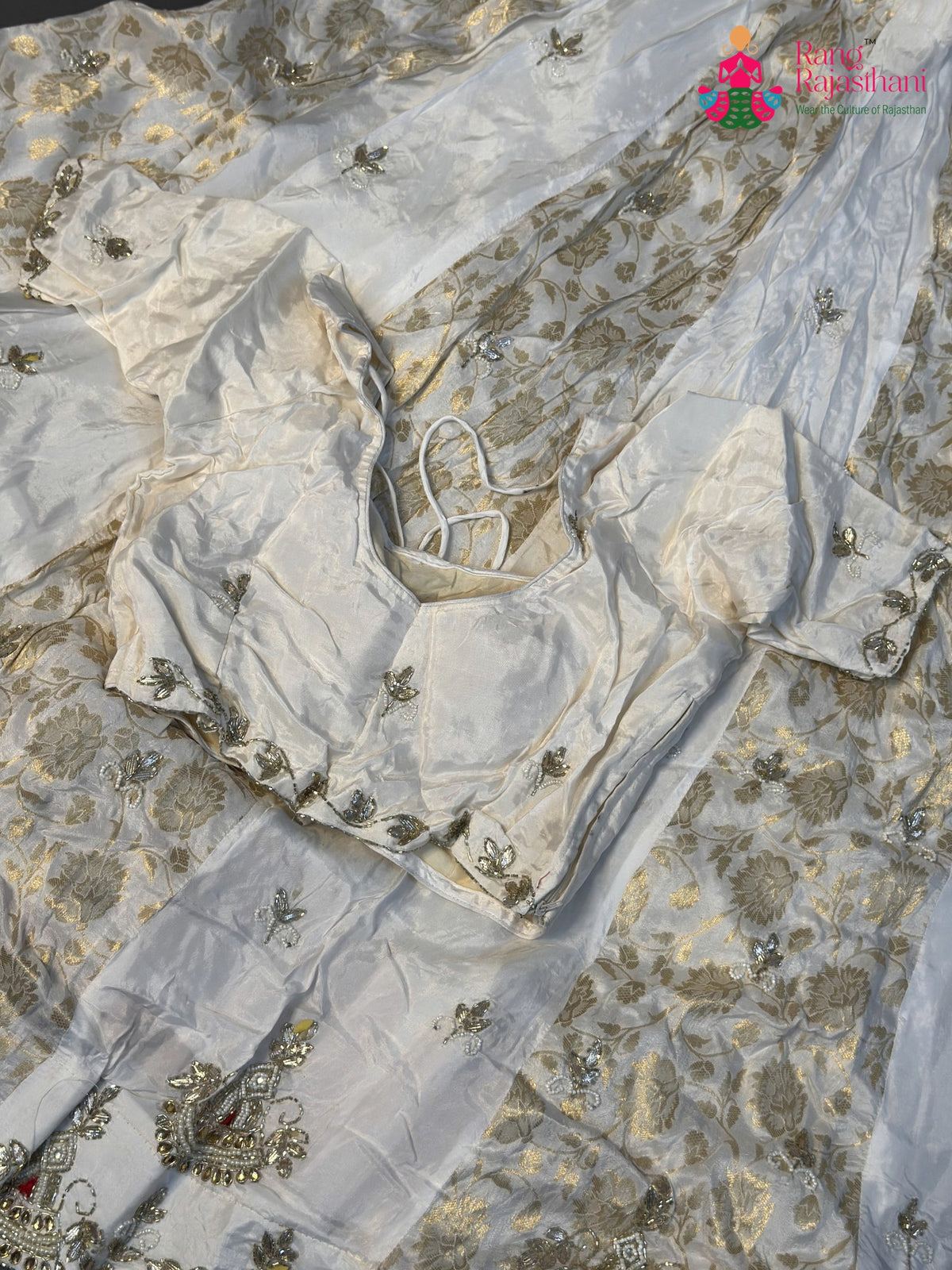 border detail of white pure upada silk hand embellishment lehenga chunni