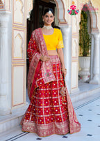 Red Russian Silk saree with Ghatchola Bandhani Work side drape view