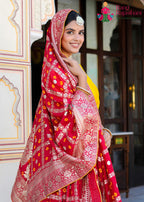 Red Russian Silk saree with Ghatchola Bandhani Work close up detailing