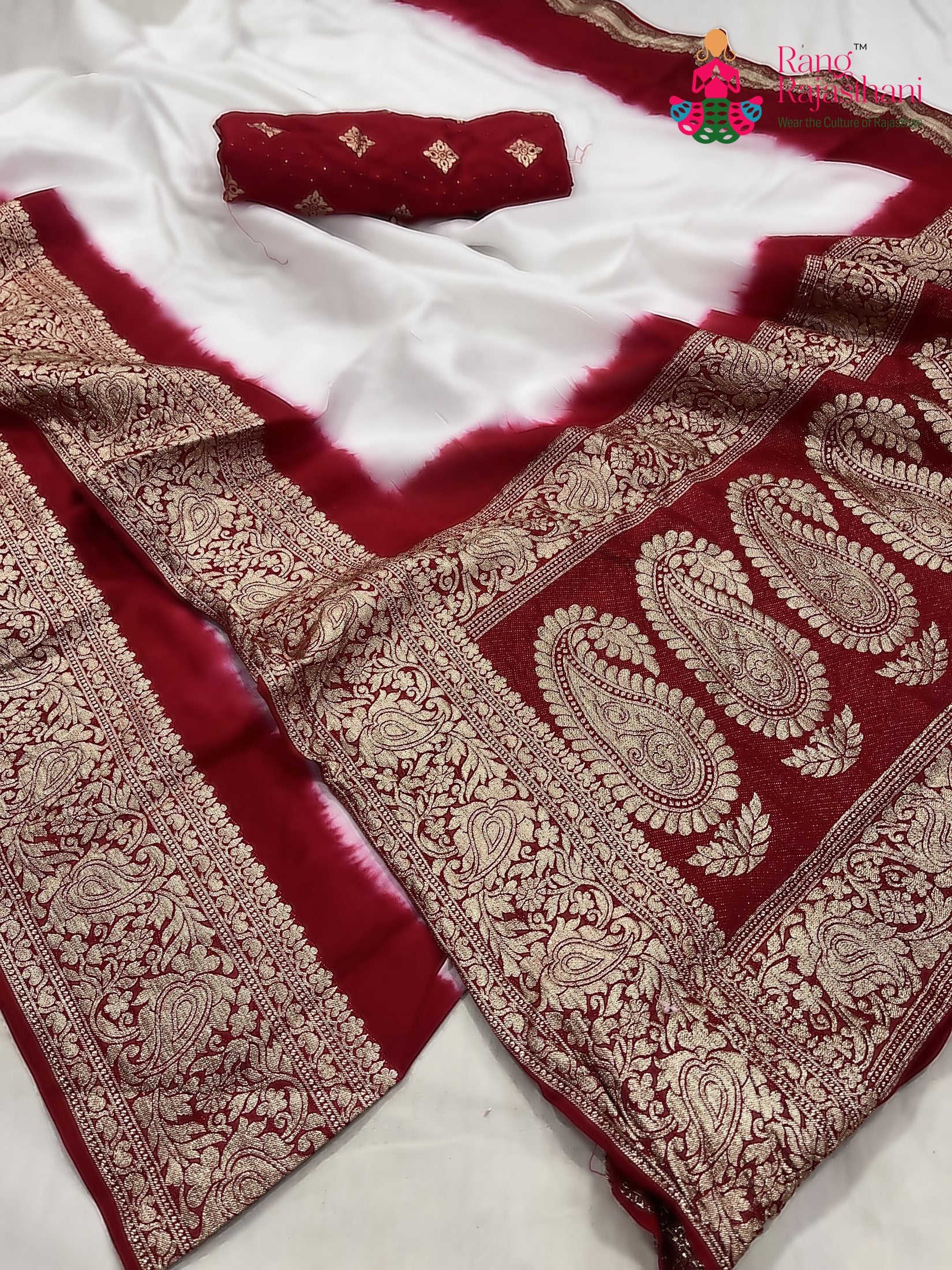 close up detailing of white russian silk banarasi zari weave faag saree 