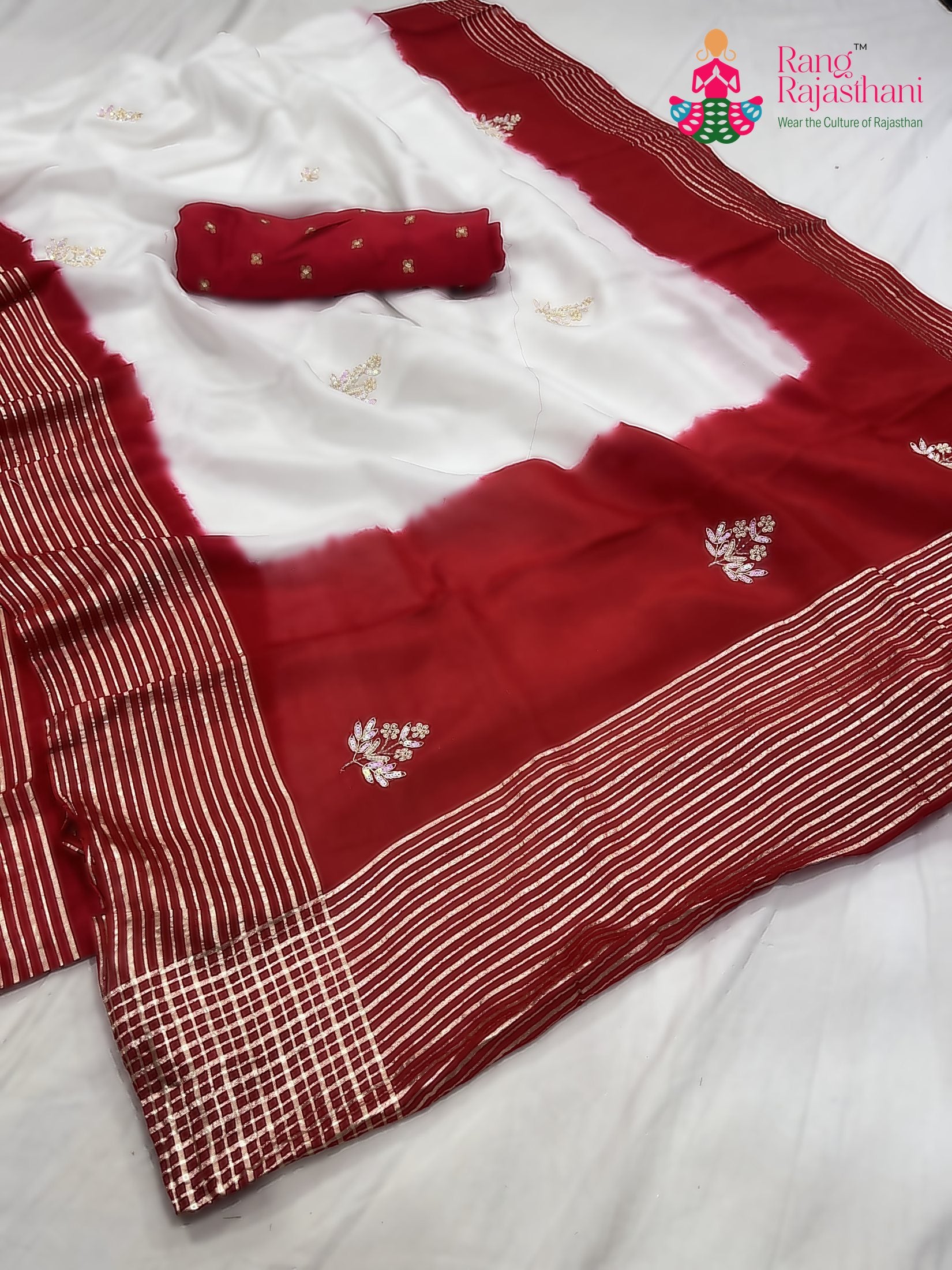 close up detailing of white russian silk hand embellishment faag saree 