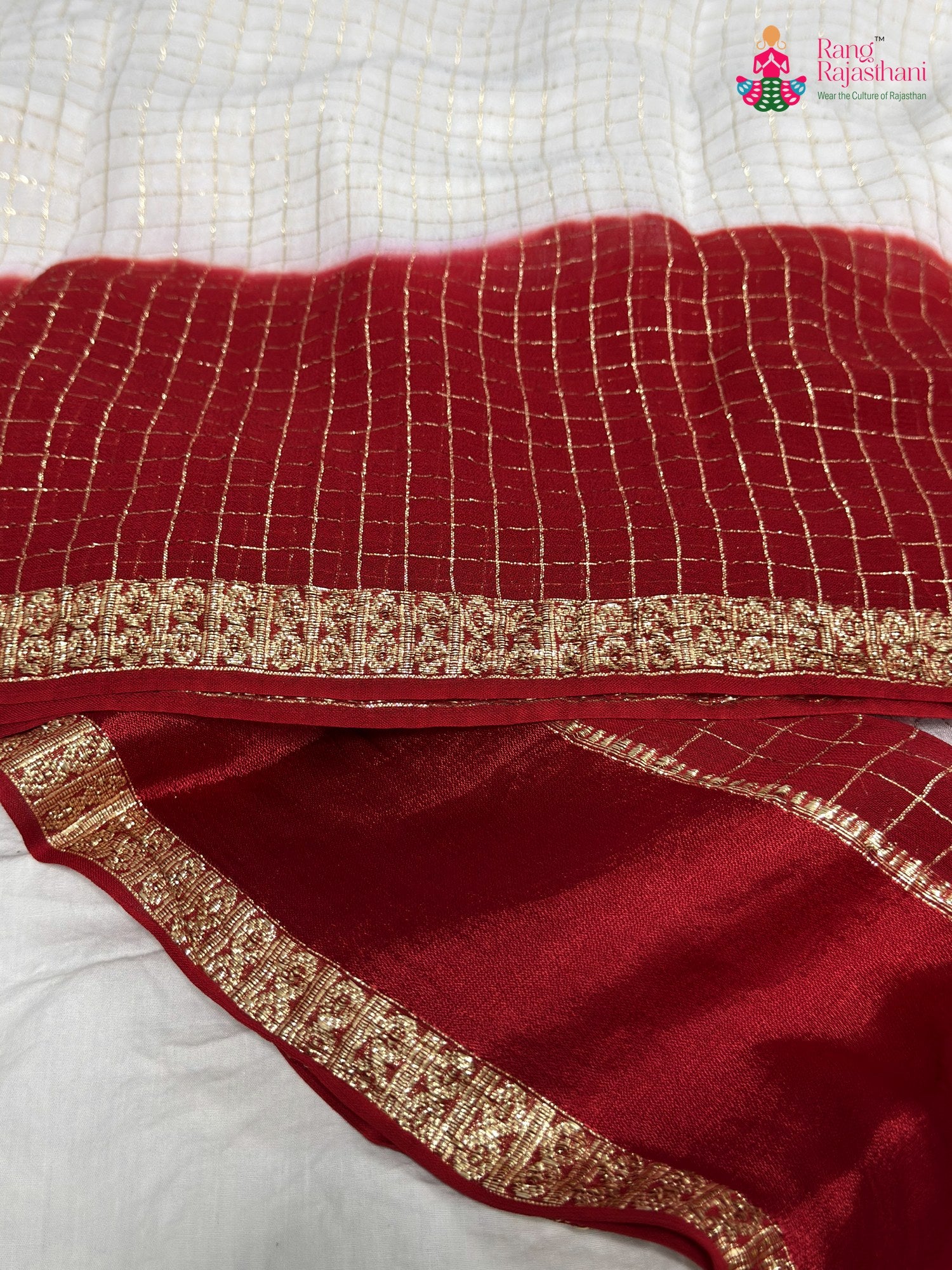 design pattern of white soft georgette banarasi zari weave saree