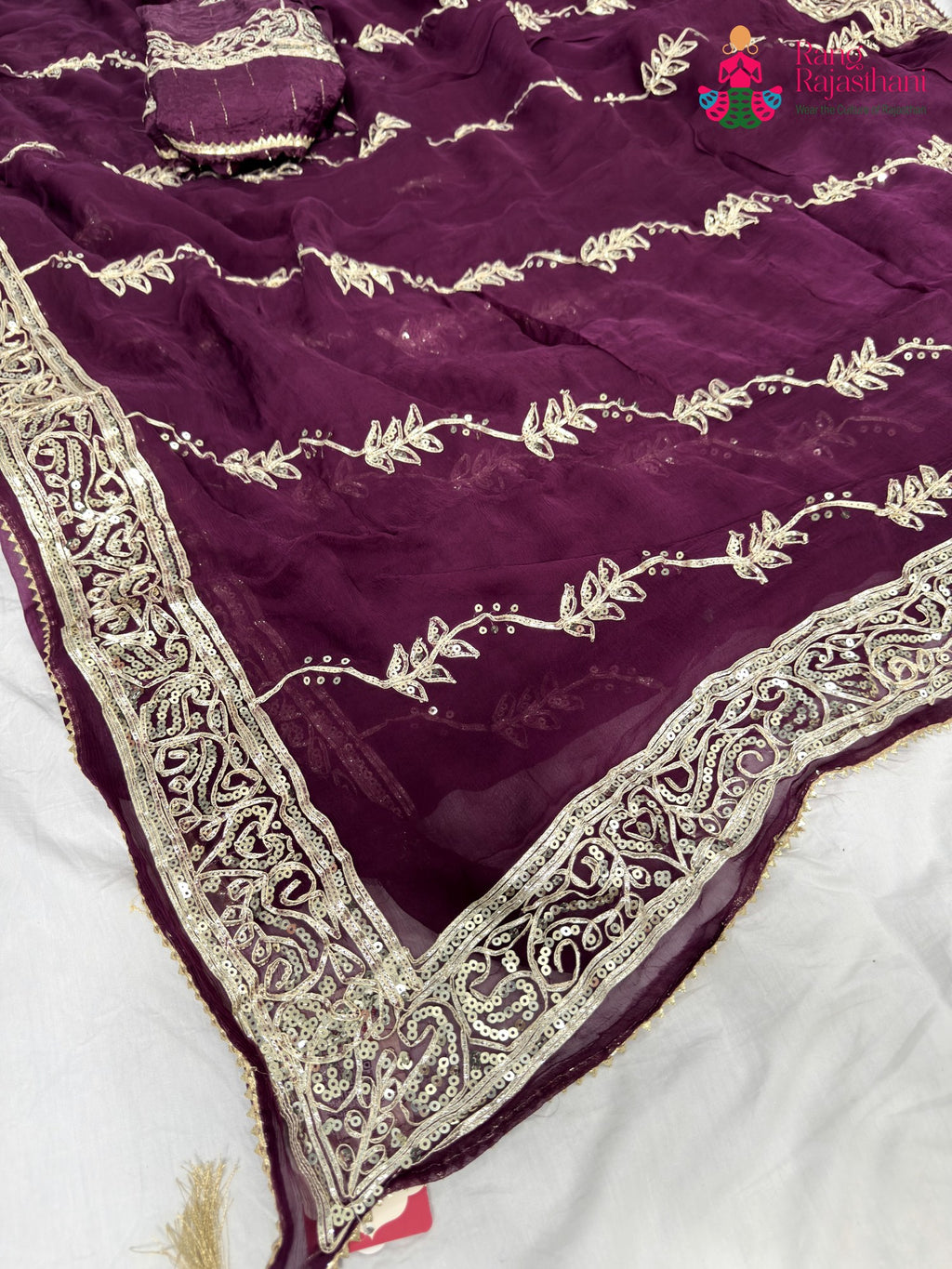 pallu detailing of wine chiffon gota patti saree