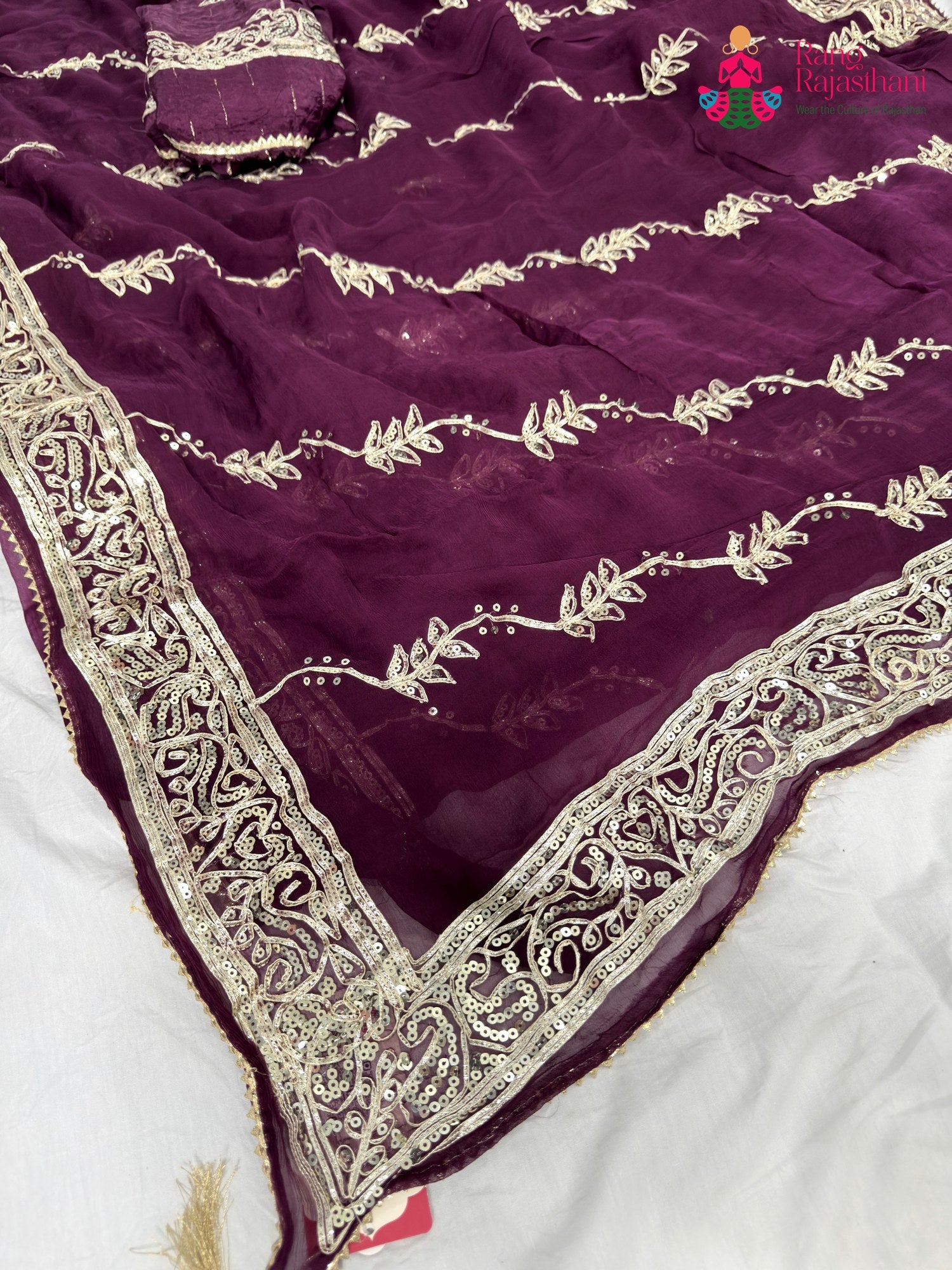 pallu detailing of wine chiffon gota patti saree