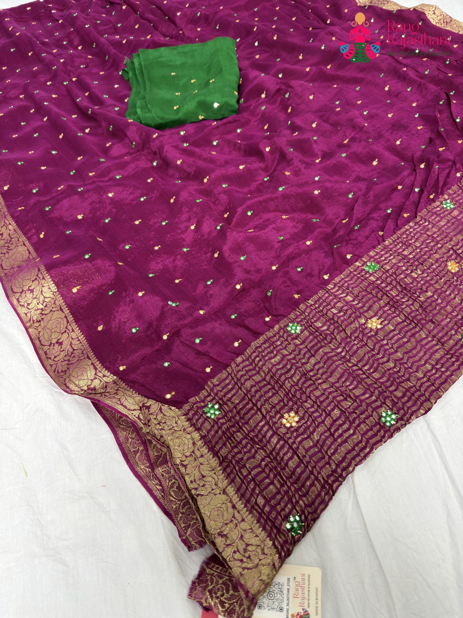 pallu detailing of wine chinnon banarasi zari weave saree