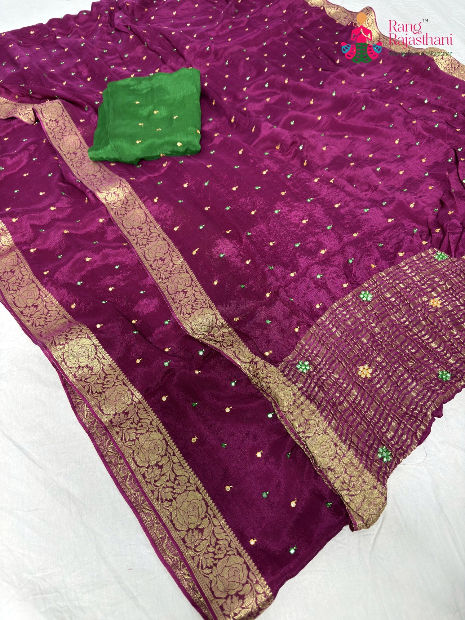 border detailing of wine chinnon banarasi zari weave saree