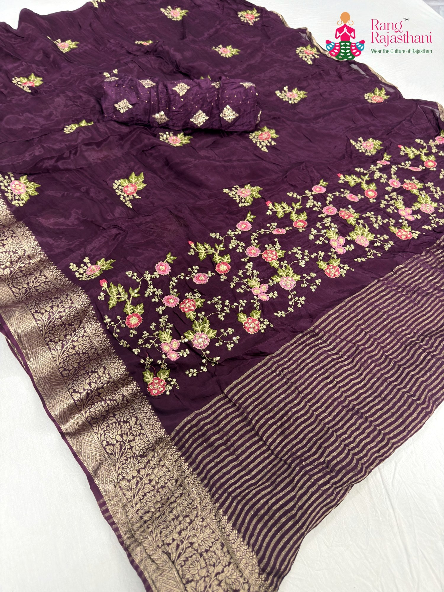 pallu detailing of wine chinnon resham embroidery saree