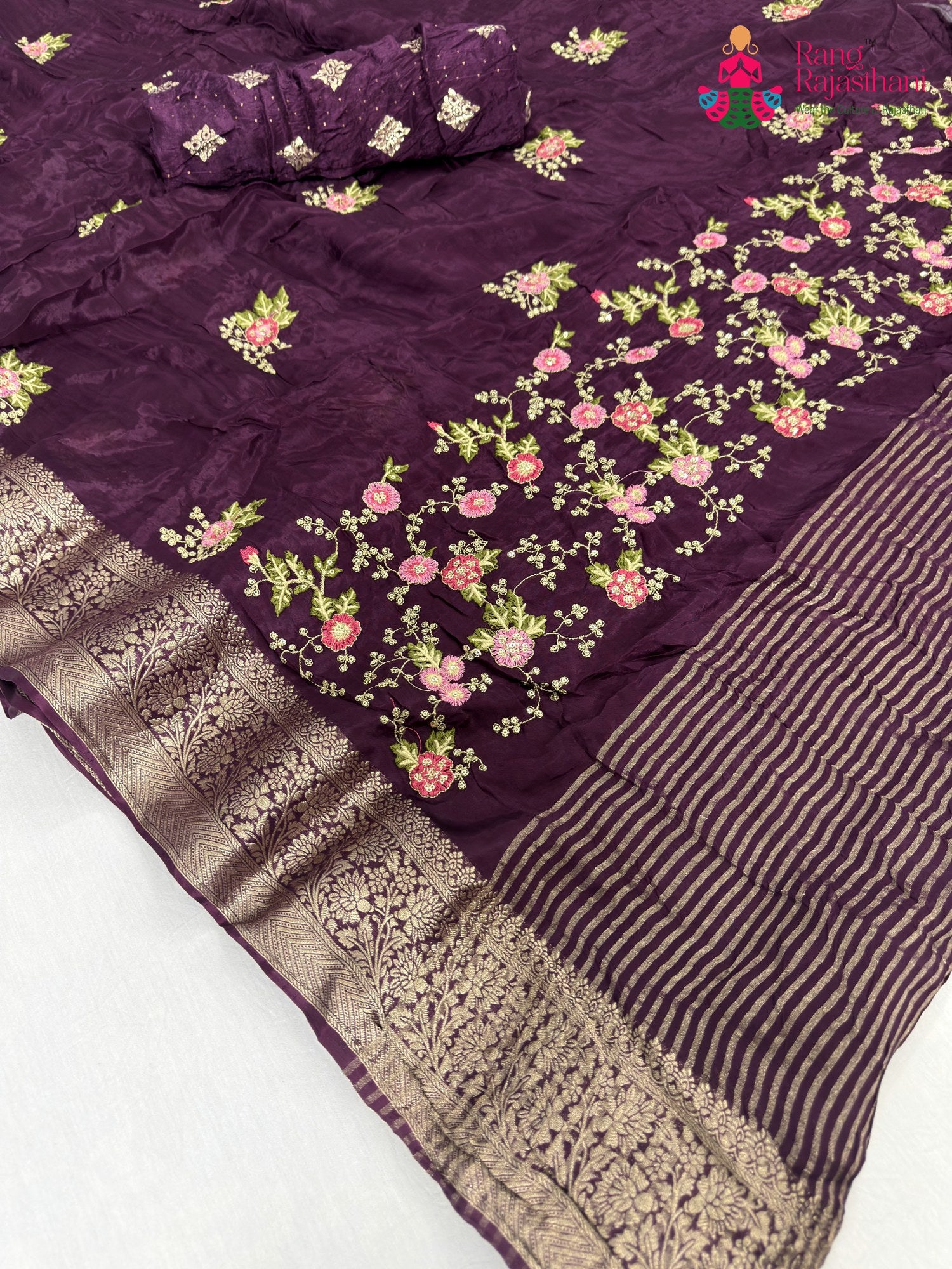 close up detailing of wine chinnon resham embroidery saree