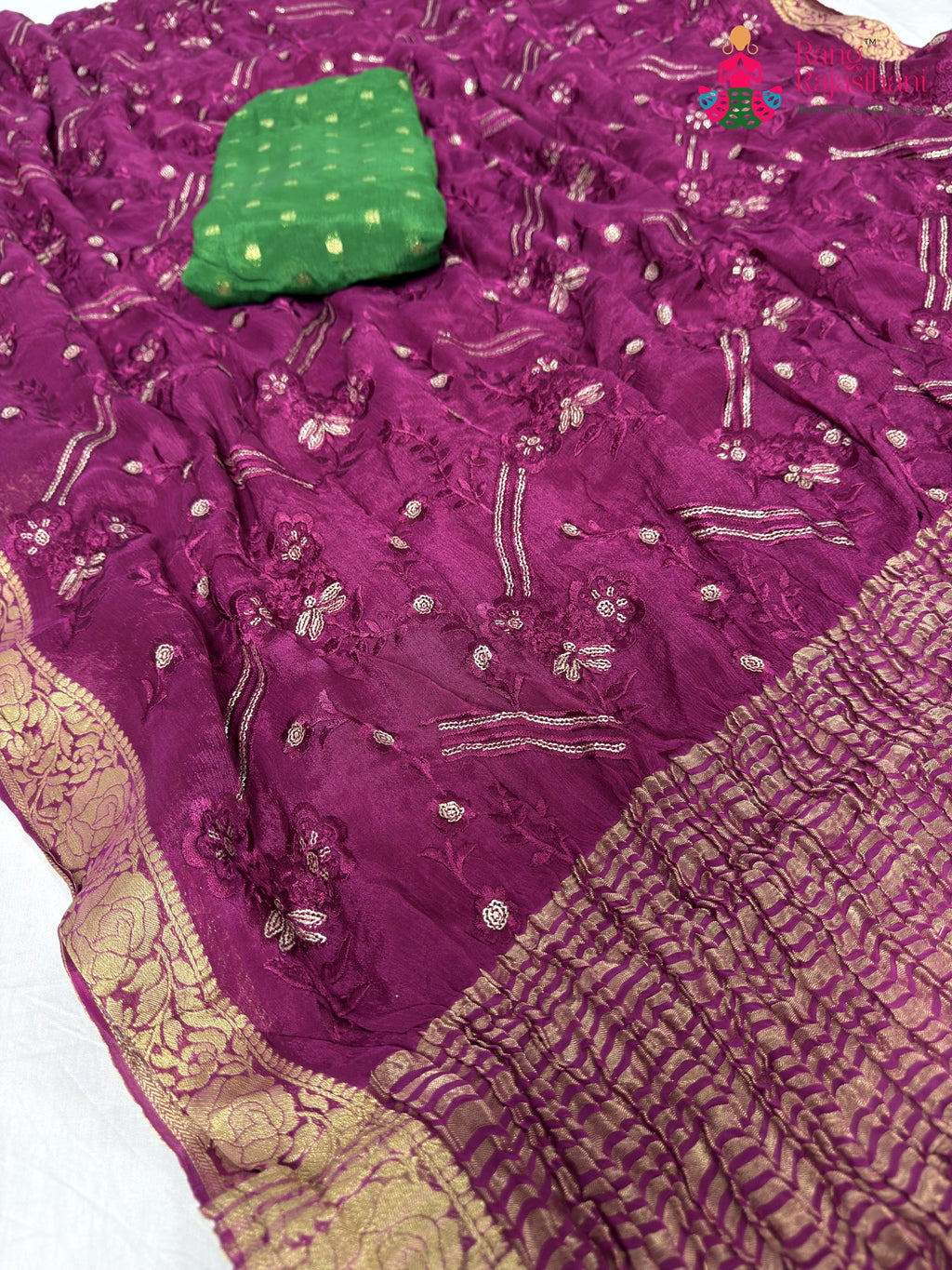 pallu detailing of wine chinnon sequin saree