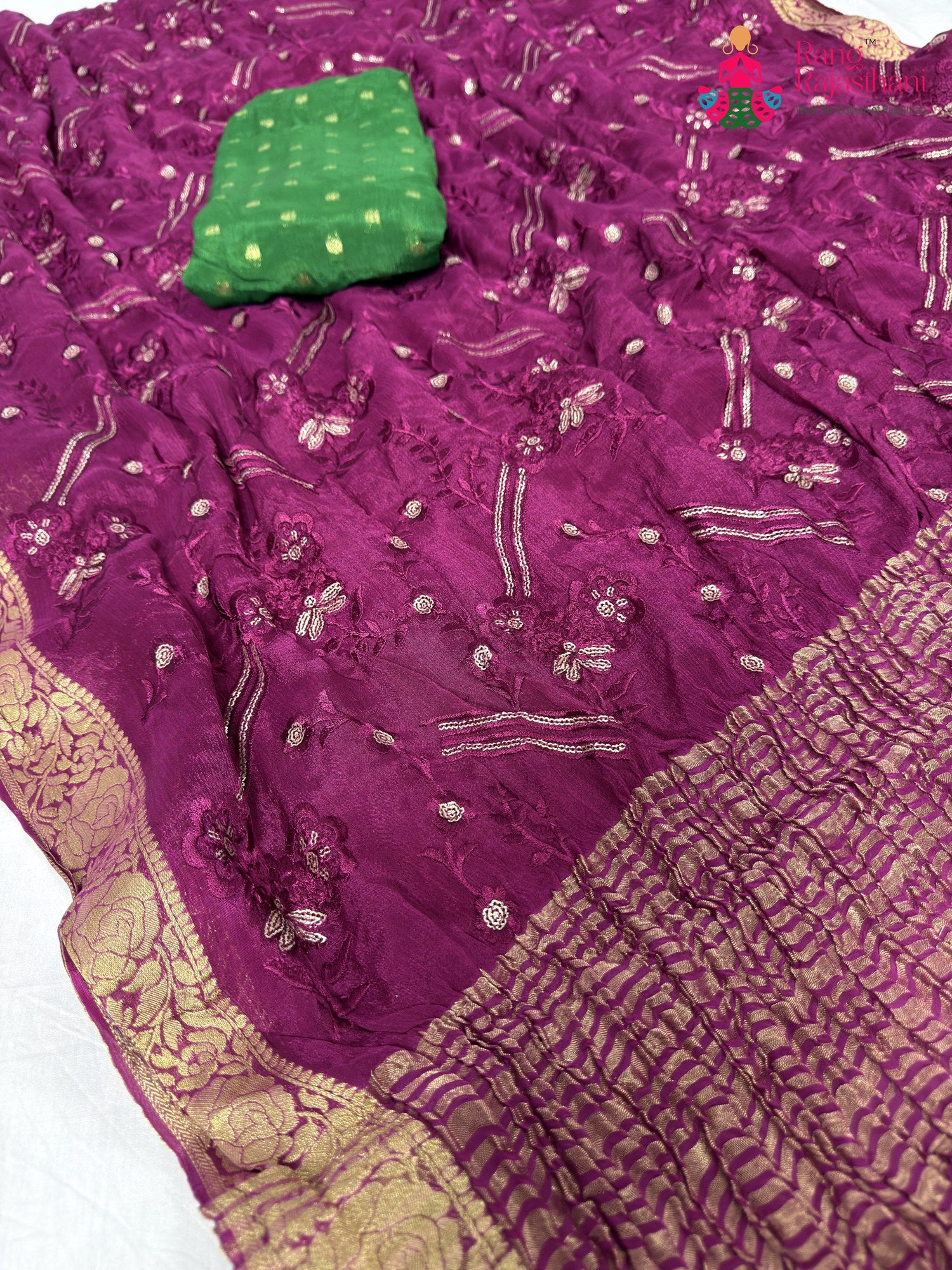 pallu detailing of wine chinnon sequin saree