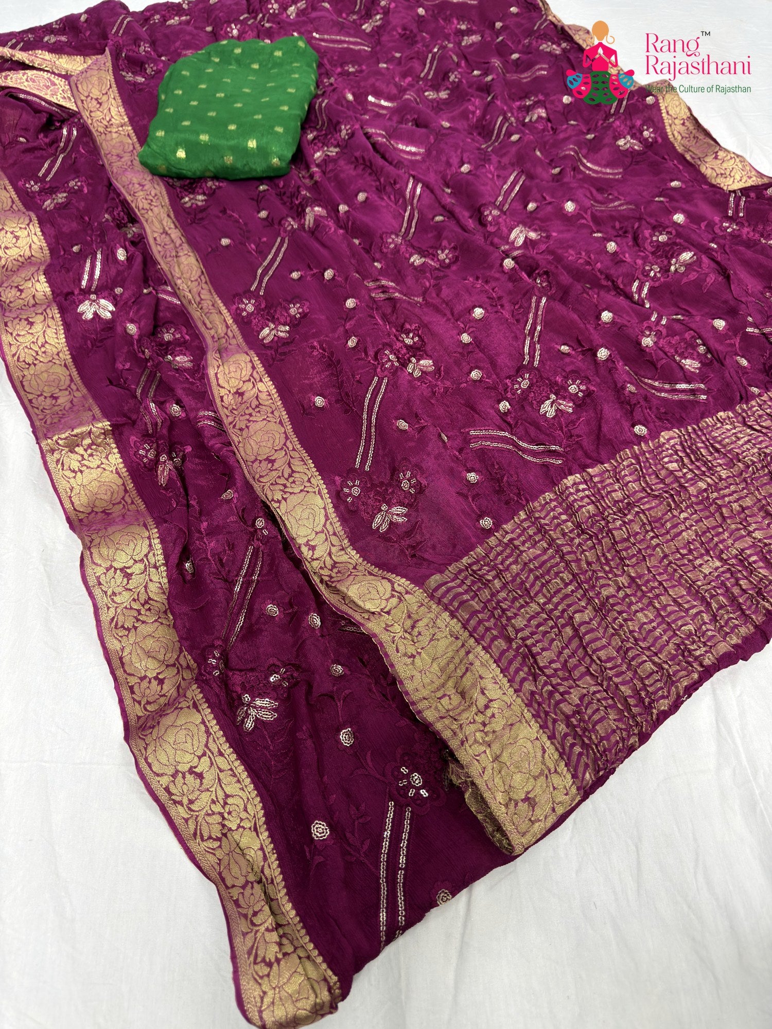 close up detailing of wine chinnon sequin saree