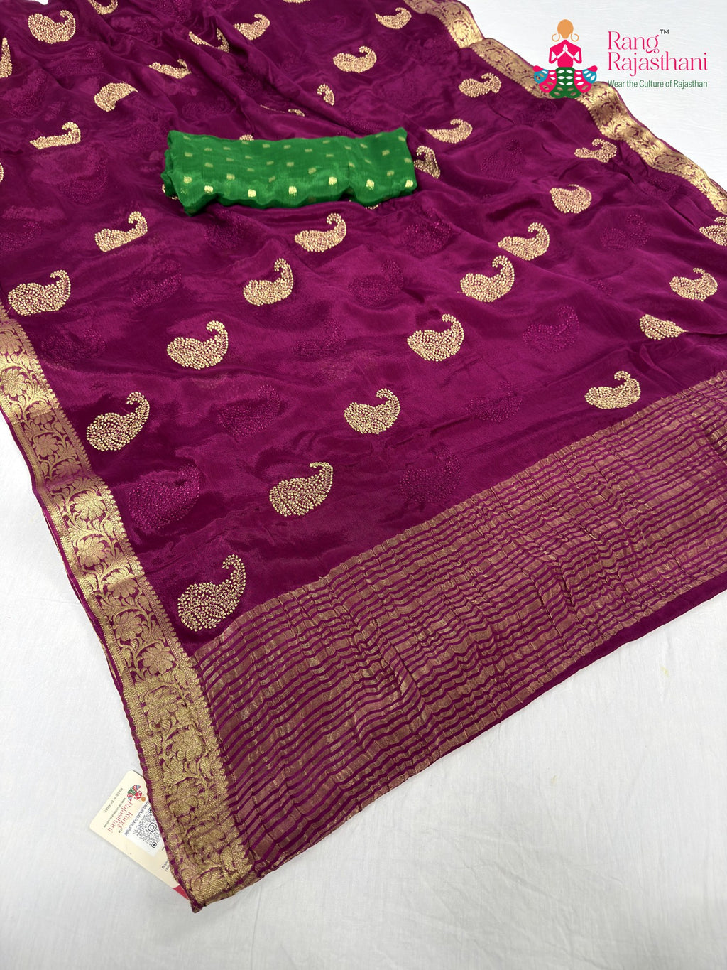 pallu detailing of wine chinnon zari embroidery saree