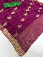 close up detailing of wine chinnon zari embroidery saree