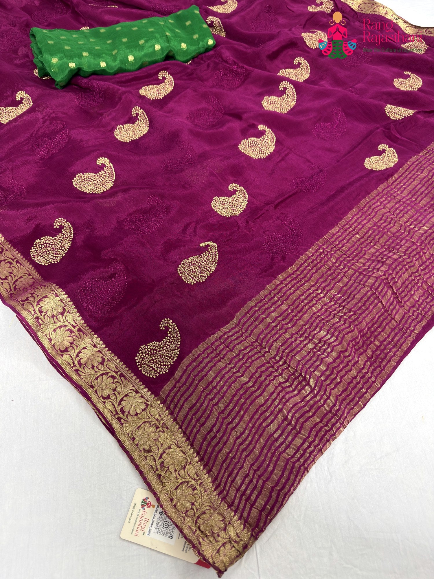 close up detailing of wine chinnon zari embroidery saree