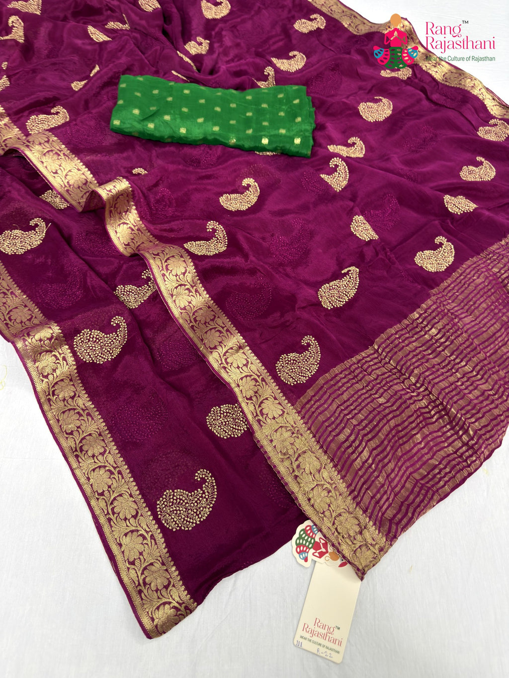border detailing of wine chinnon zari embroidery saree