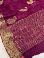 pallu detailing of wine chinnon zari embroidery saree