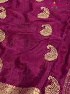 design pattern of wine chinnon zari embroidery saree