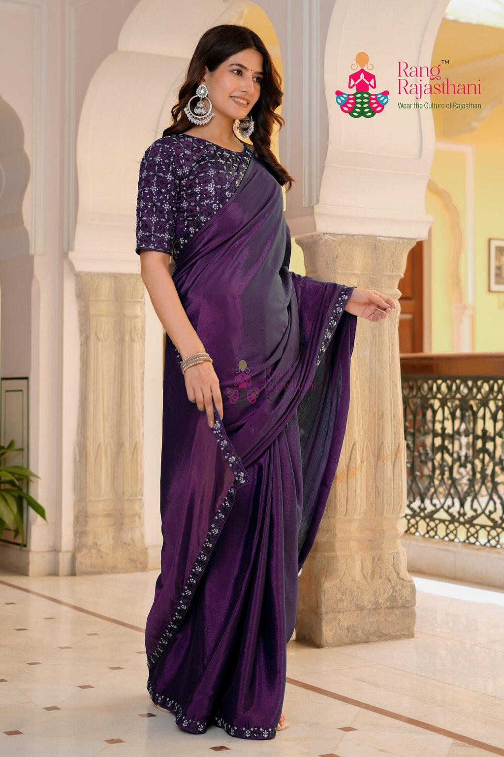 close up detailing of wine fabric saree 