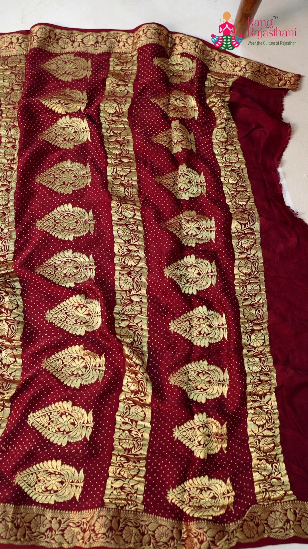 border detail of wine modal banarasi zari weave gharchola saree
