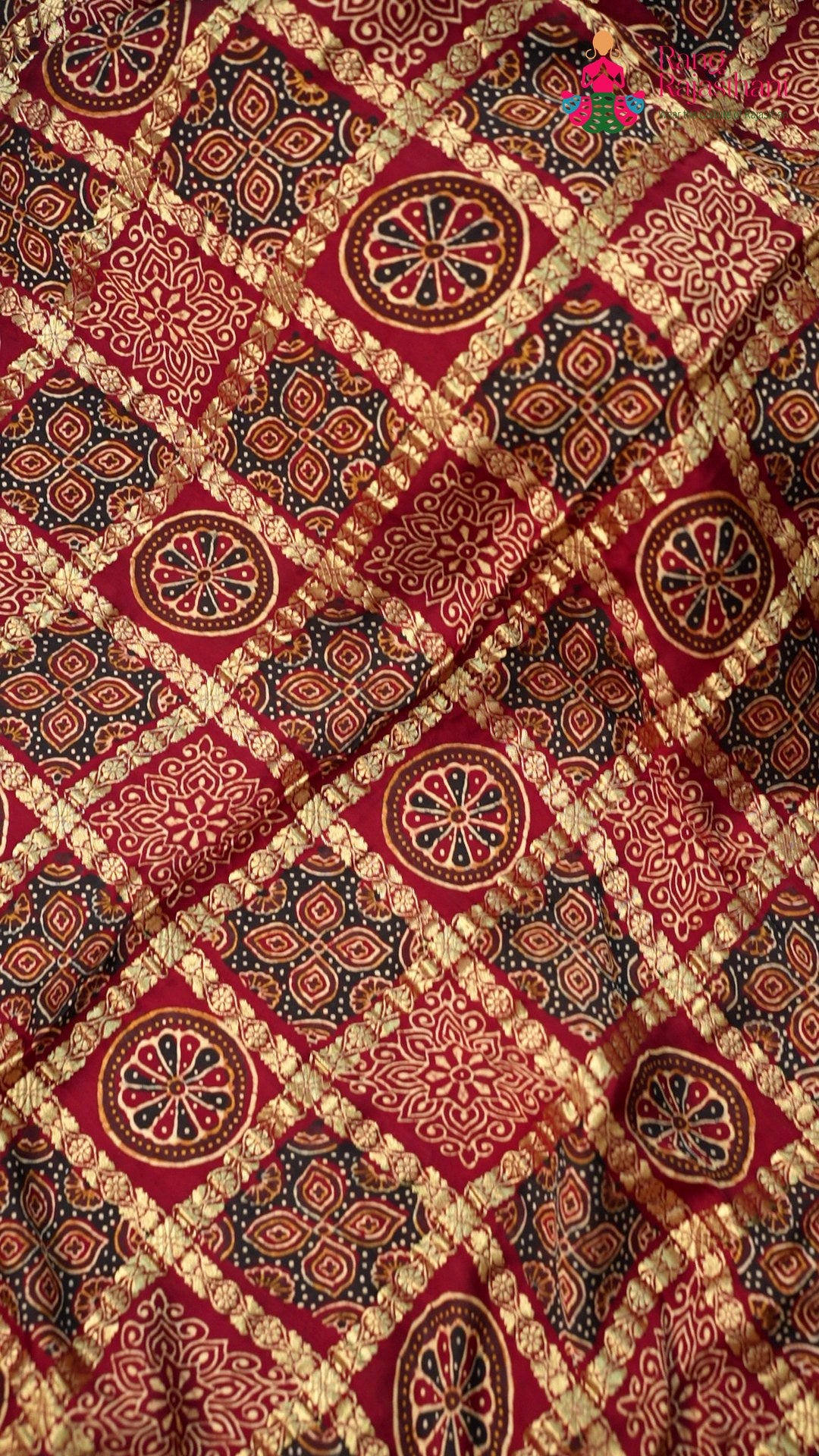 close up view of wine modal banarasi zari weave gharchola saree